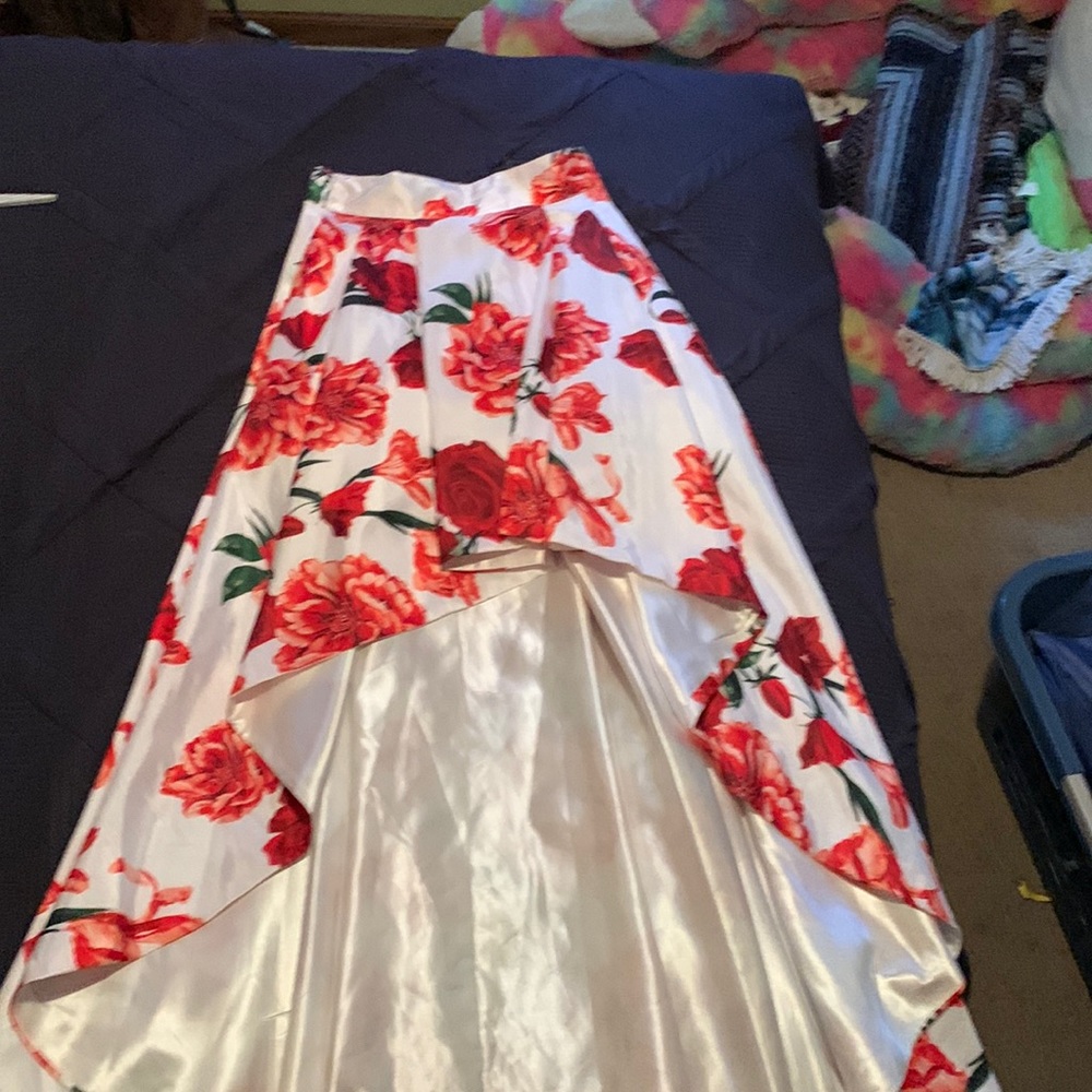 High low skirt with matching red crop top
